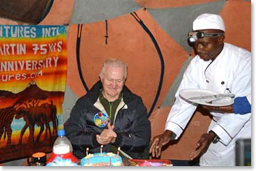 Doc being presented his cake.