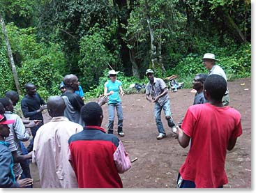 One of the BAI staff leading the song