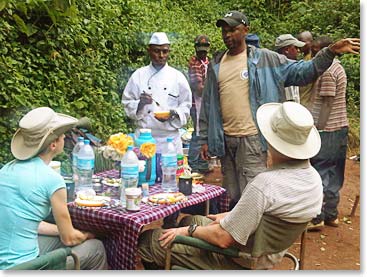 The chef and guide letting Janet and Bruce know what can be expected next