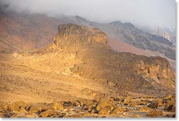 The sun breaks on Lava Tower Camp.