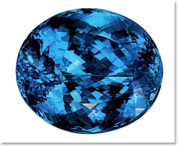 A Tanzanita tem aspecto similar a turmalina brasileira, que pode ser encontrada em diversas cores, dependendo da concentração de aluminio, ferro, magnesio, sódio, lítio ou potassio. Aqui é a Turmalina Paraíba (The Tanzanite has some  similar aspects of the Brazilian Tourmaline, which can be found in a big variety of colors, depending on the concentration of aluminum, iron, magnesium, sodium, lithium, or potassium. Here is the Brazilian Paraíba Tourmaline.)