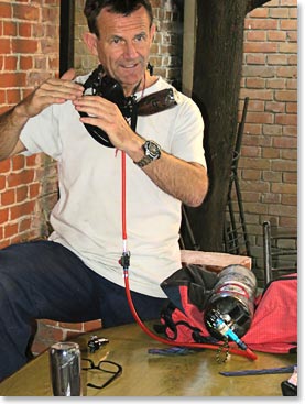 Ted Atkins explains his mask, which each of our BAI climbers will be using.