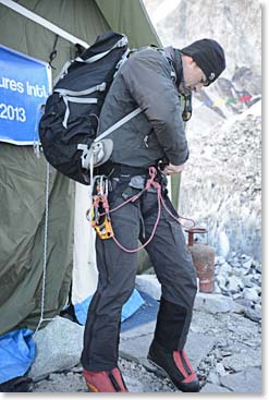 Todd prepares for the Icefall outside the dining tent. 
