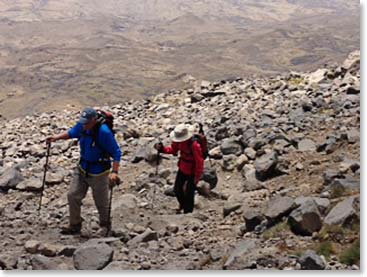 We climbed to coca cola camp in only 1 1/2 hours today.   After four hours we had reached high camp at 13,600 feet.  Here Woodie and Cary keep a good pace approaching 13,000 feet.