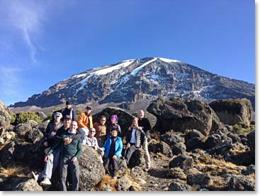 What a morning! The team with our mountain behind.