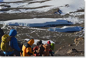 Climb down to the crater camp after reaching the summit.