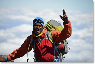 Bryan encouraging the team on, high above the clouds of Africa
