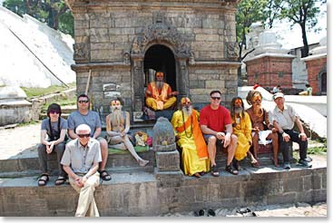 The team takes a photo with the Hindu Holy men.