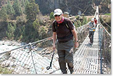 Jim Brown smiling as he crosses the next bridge