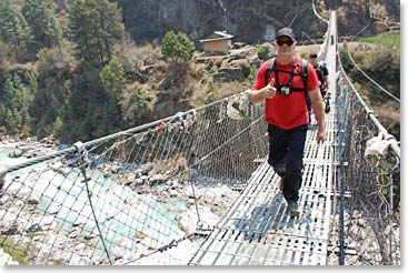 Jim Allen gives a thumbs up along the bridge
