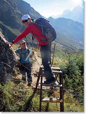Climbing a ladder over a barb wire
