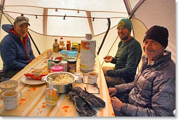 The team enjoys the snacks at base camp