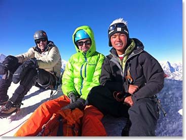 Travis Frank and Sanduk on the summit of Island Peak