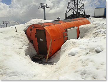 Meanwhile, still in Russia but far, far away on Mount Elbrus, Vladimir sent us this picture from a few days ago of our “Barrel” on the mountain. A lot of snow this year! We will be on our way tomorrow!