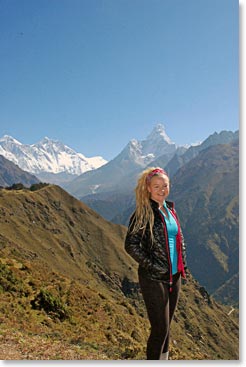 Alyssa with Everest, Lhotse and Ama Dablam above her!