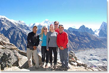 The team and Everest at the background