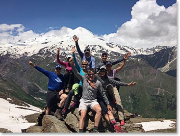What luck! The rain stopped and the clouds cleared.  The team at our high point for our first day:  11,500 feet with Mount Elbrus behind.
