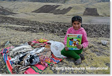 This is the little girl who sold the hat - Paula had brought some coloring books from Cincinnati, one of them made a perfect gift for this remarkable young girl.
