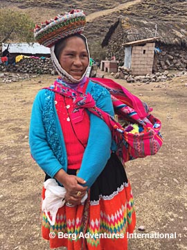 This woman had her 10-month old baby keeping warm in the woven blanket she carried