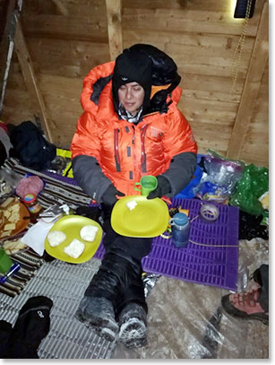 Kara the night before beginning the climb in the Berlin Camp A frame shelter, 19,200 feet.