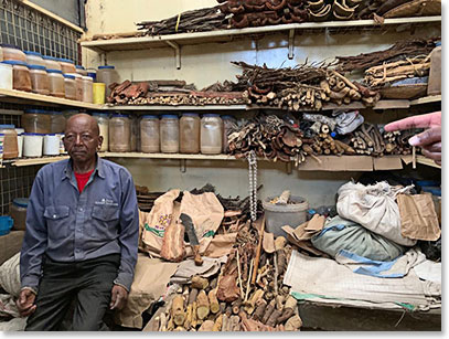 This 80 year old Maasai doctor has a stall in the central market in Arusha. He prescribes and sells hundreds of varieties of natural remedies