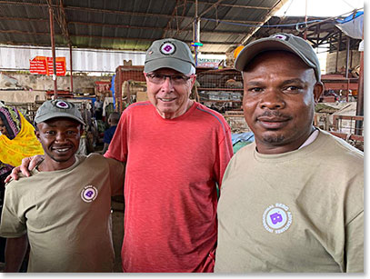 Cornel, Jim Brown and Alex at the Arusha market