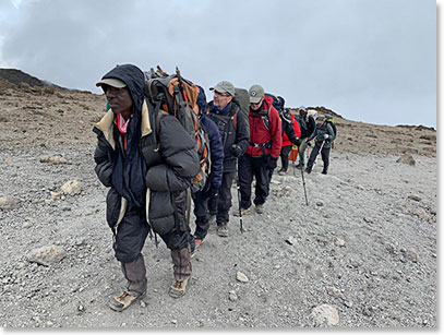 The team climbing to Kosovo