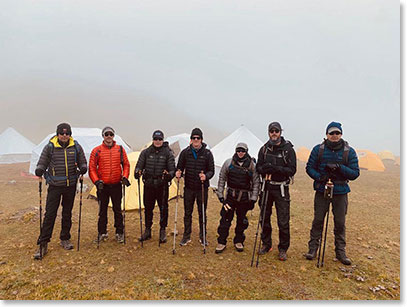 Team leaving Illimani Base Camp for their first acclimatization hike