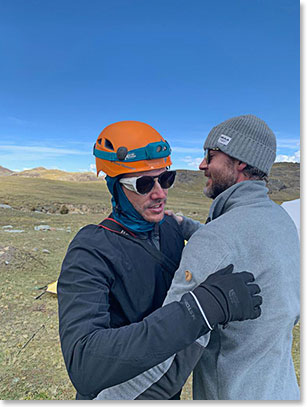 Kyle welcomes Zack back at base camp after Zack’s successful summit